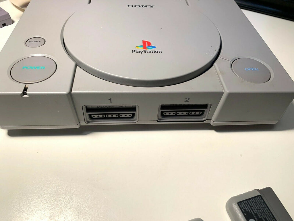 1 PS1 Console with Cables & Original Teste – Game Island