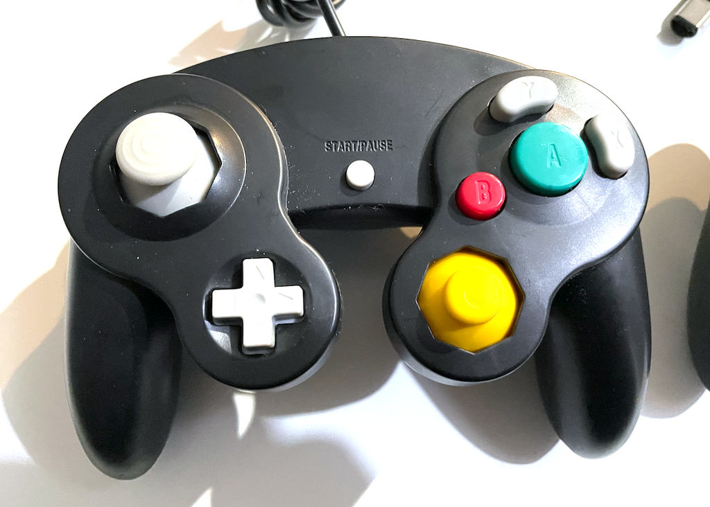 LOT OF 2 NINTENDO GAMECUBE JET BLACK CONTROLLERS Tested + Working!